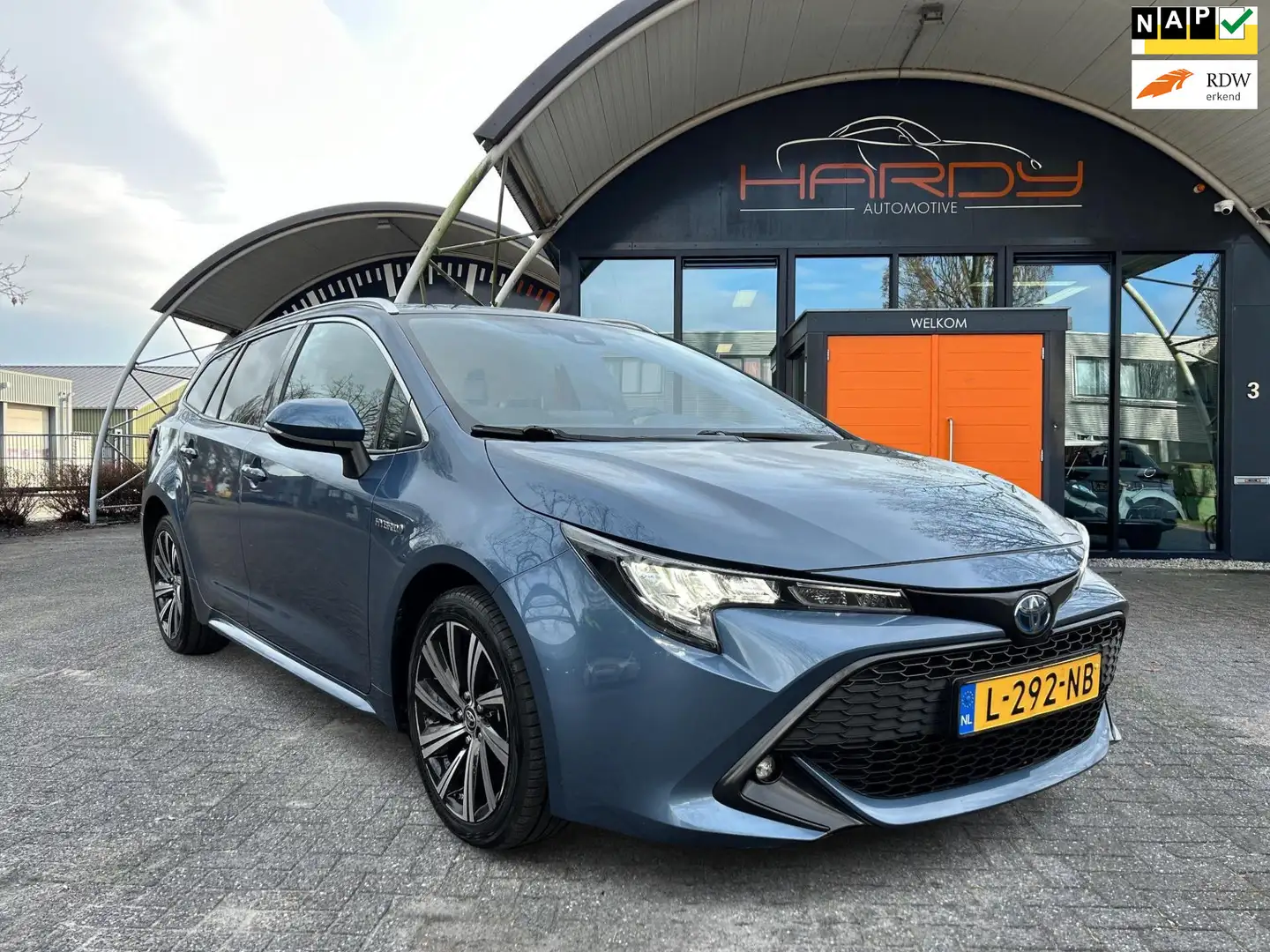 Toyota Corolla Touring Sports 1.8 Hybrid Dynamic Digi Dash Apple Blau - 1