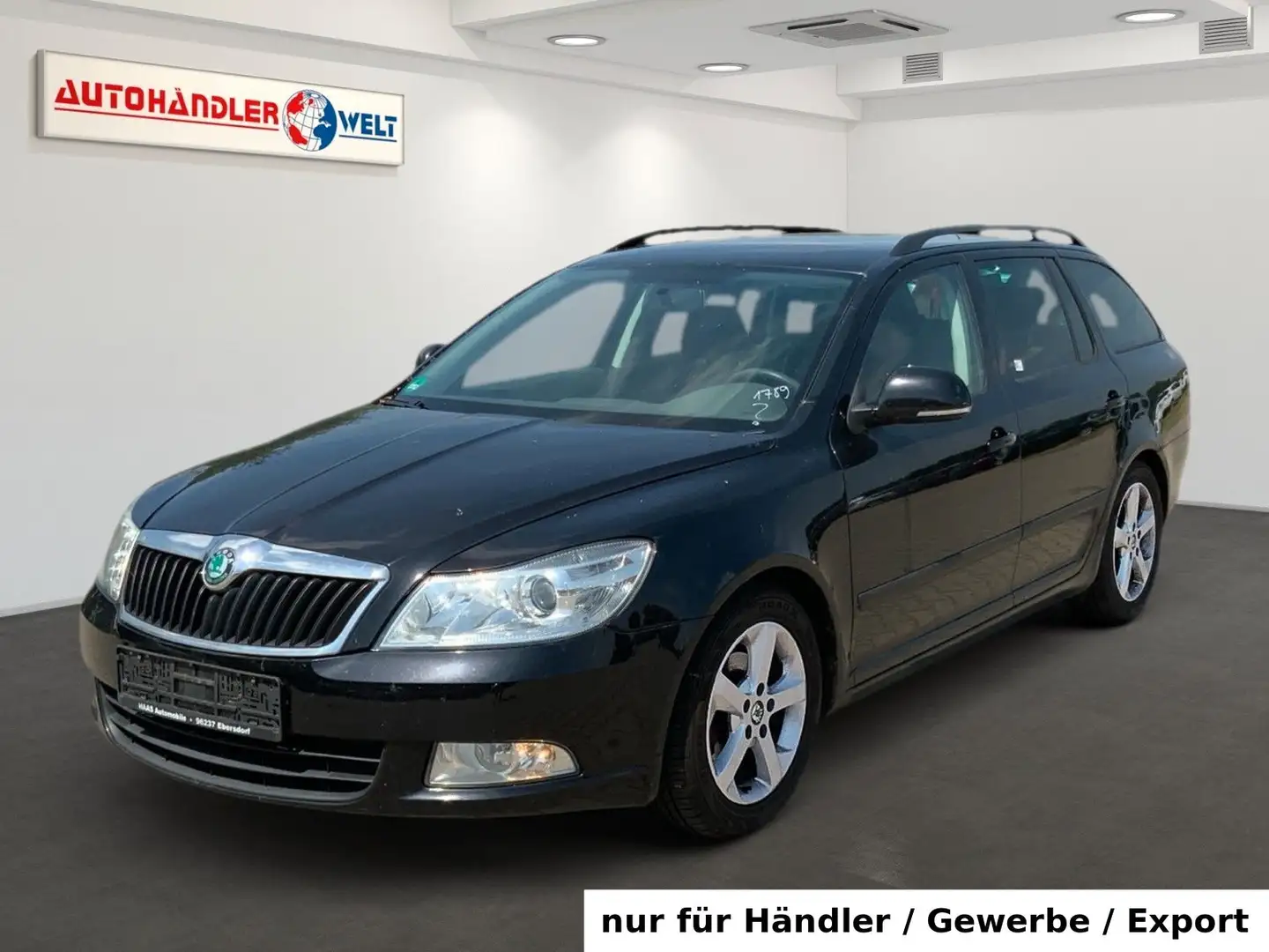 Skoda Octavia Kombi 1.4 TSI AAC SHZ PDC Tempo Zwart - 1