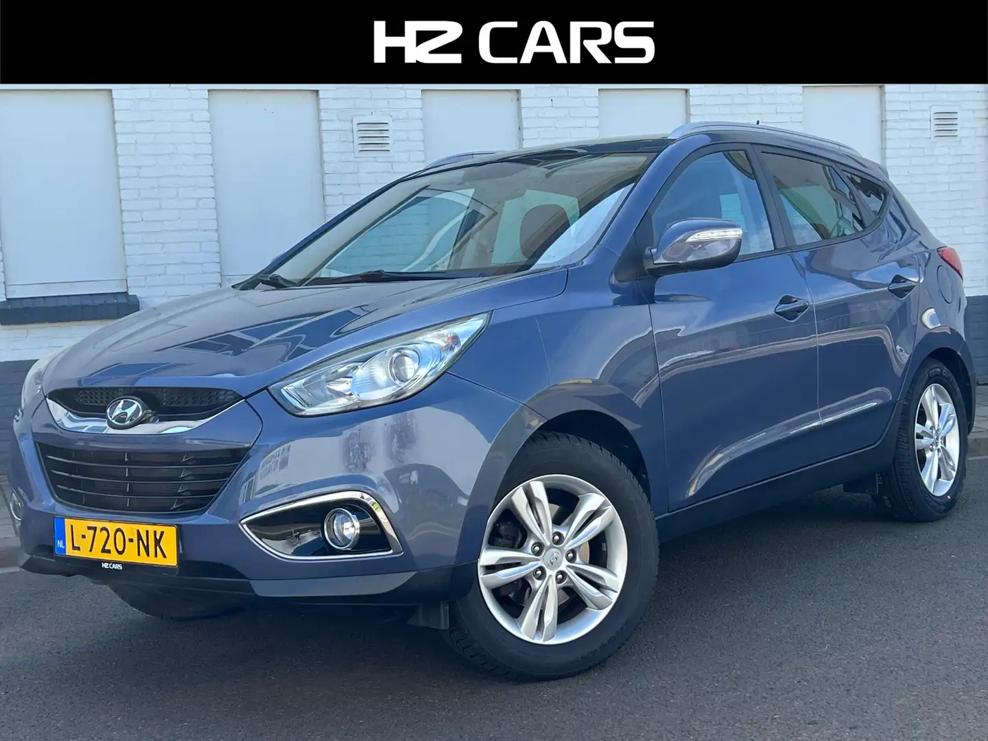 Hyundai iX35 2.0i 4WD Business Edition|Automaat|Panodak|Camera Bleu - 1