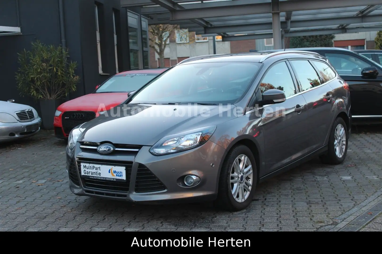 Ford Focus 1.0 Turnier Titanium*1.HAND*BLUETOOTH*PDC* Braun - 1