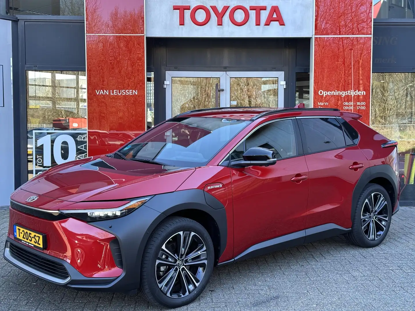 Toyota bZ4X PREMIUM 71KWH 3-FASE LEDER EL-ACHTERKLEP BLISS MEM Piros - 1