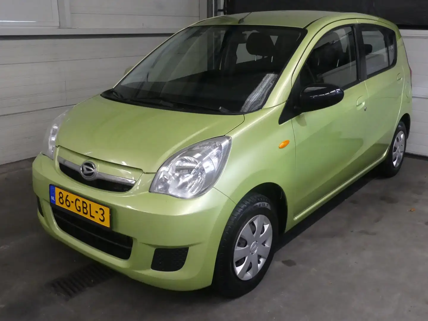 Daihatsu Cuore 1.0 Premium - 1e eigenaar - Weinig KM NAP! Groen - 1