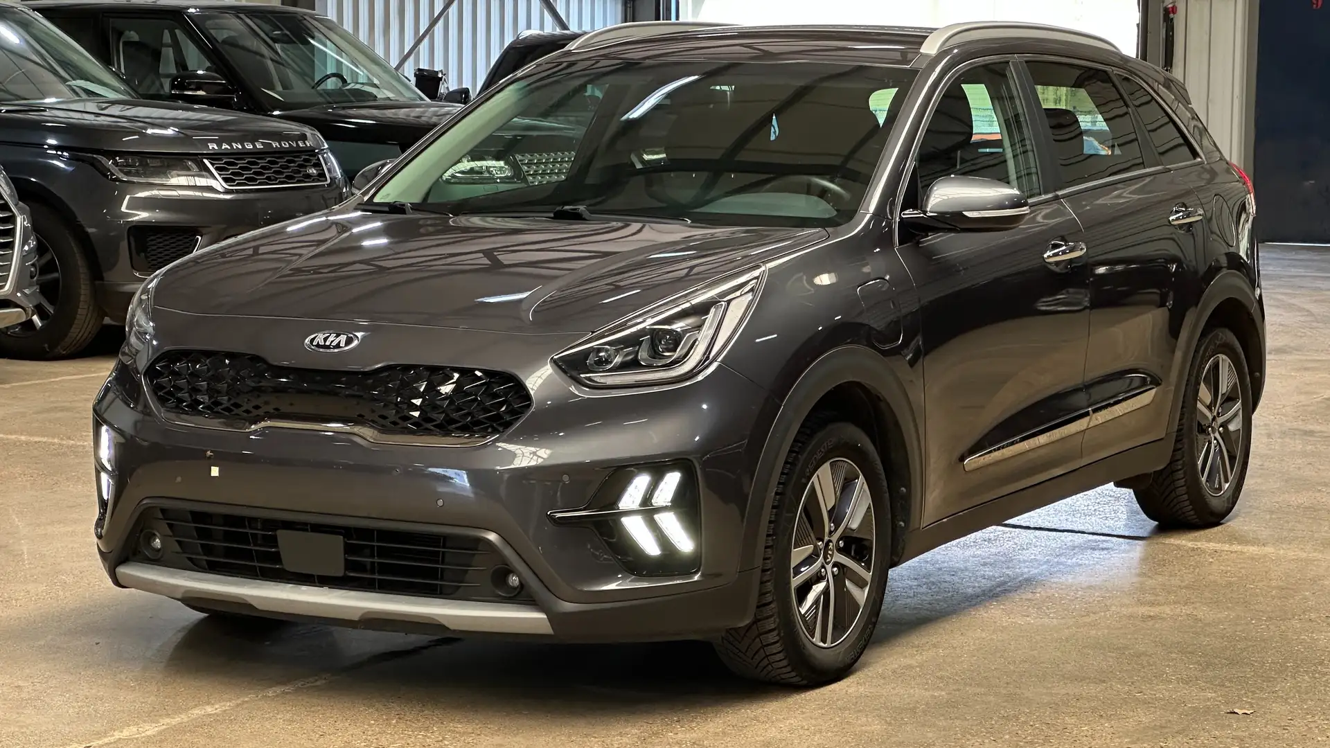 Kia Niro Niro 1.6 GDI HEV 2WD OPF Aut. Edition 7 Grijs - 1