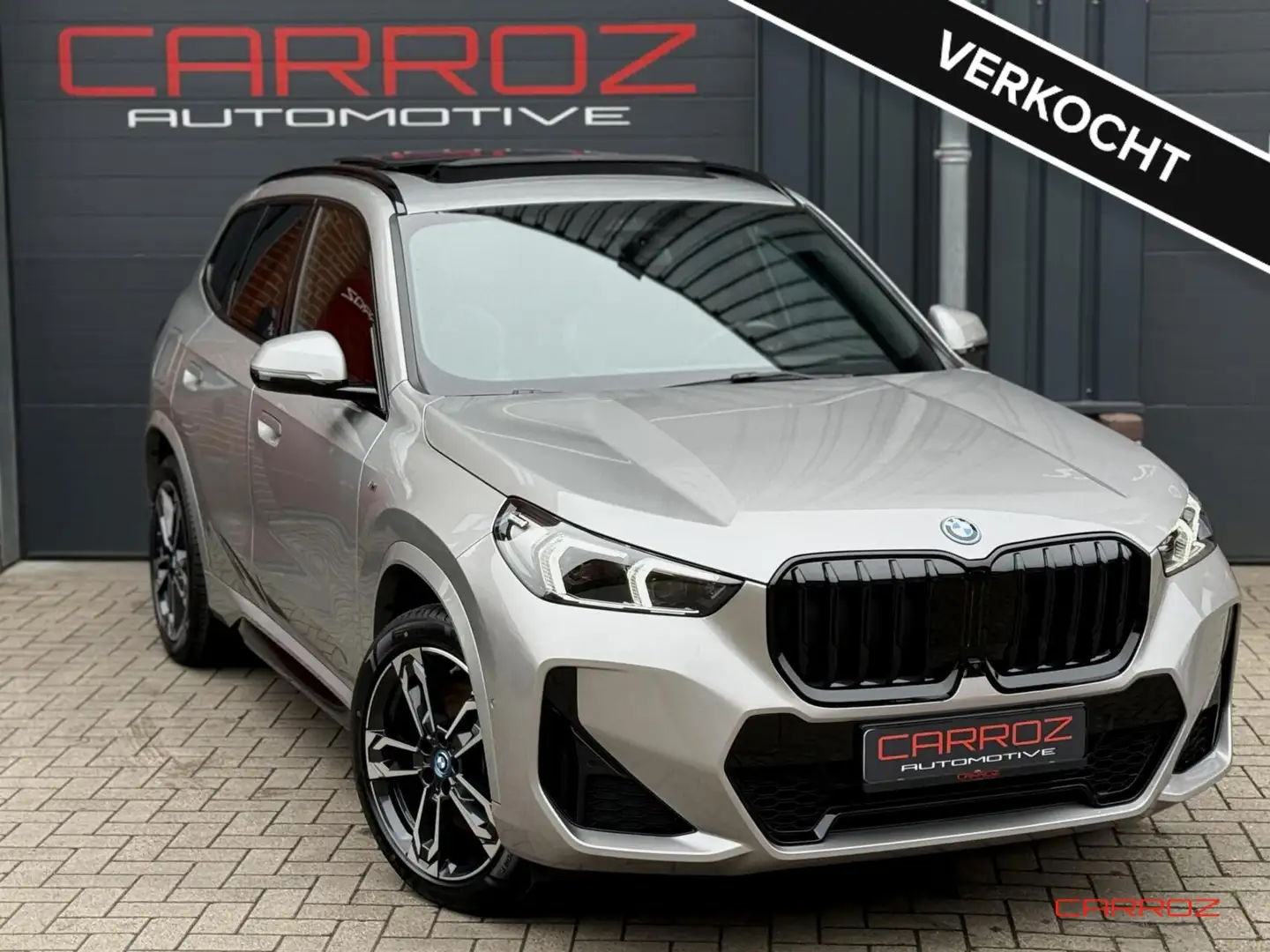 BMW X1 xDrive30e M Sport Pano Trekhaak 360 HUD H/K CarPla Grau - 1
