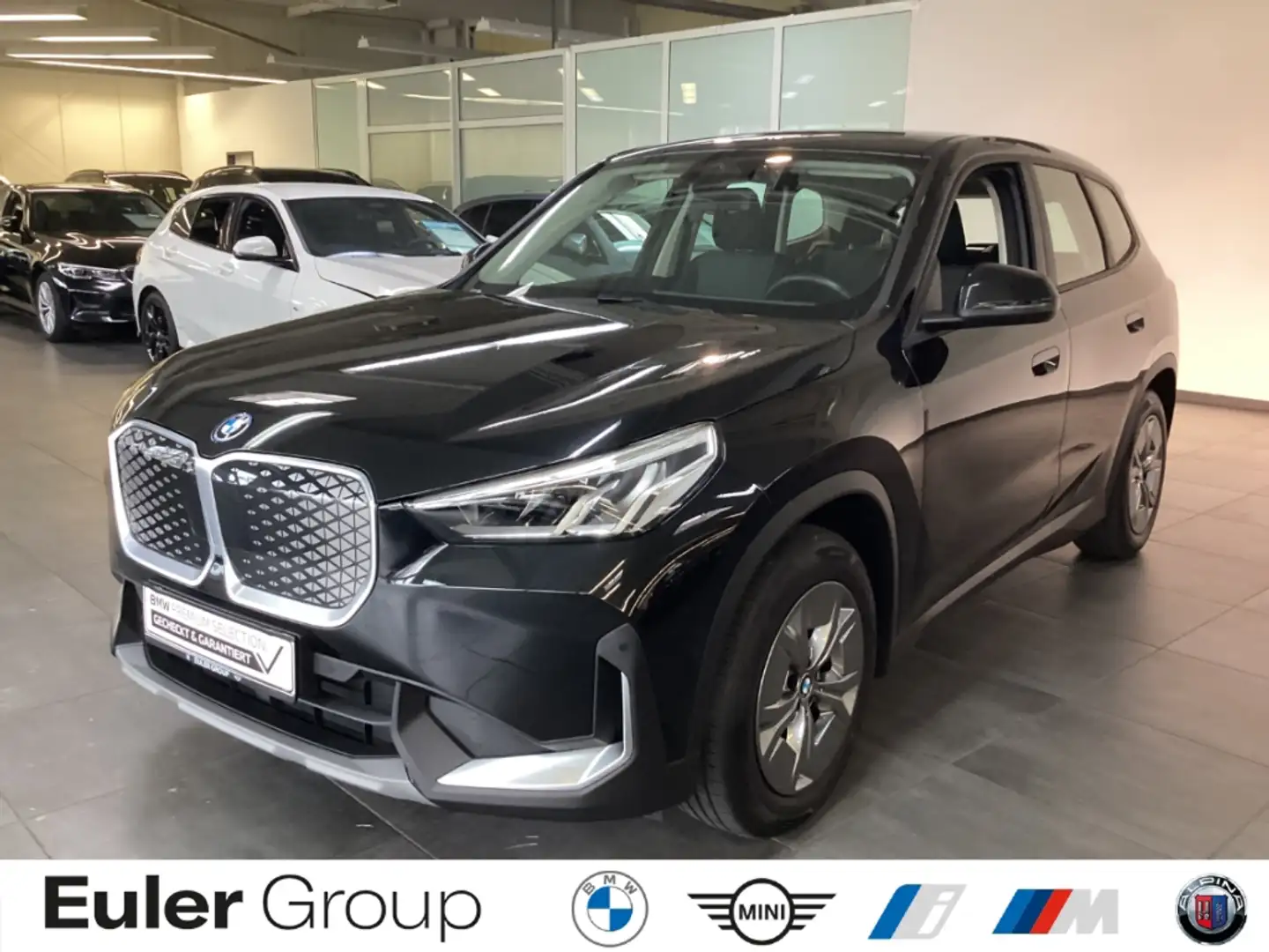 BMW iX1 xDrive 30 Parkass. AHK-klappbar Navi LED Mehrzonen Schwarz - 1