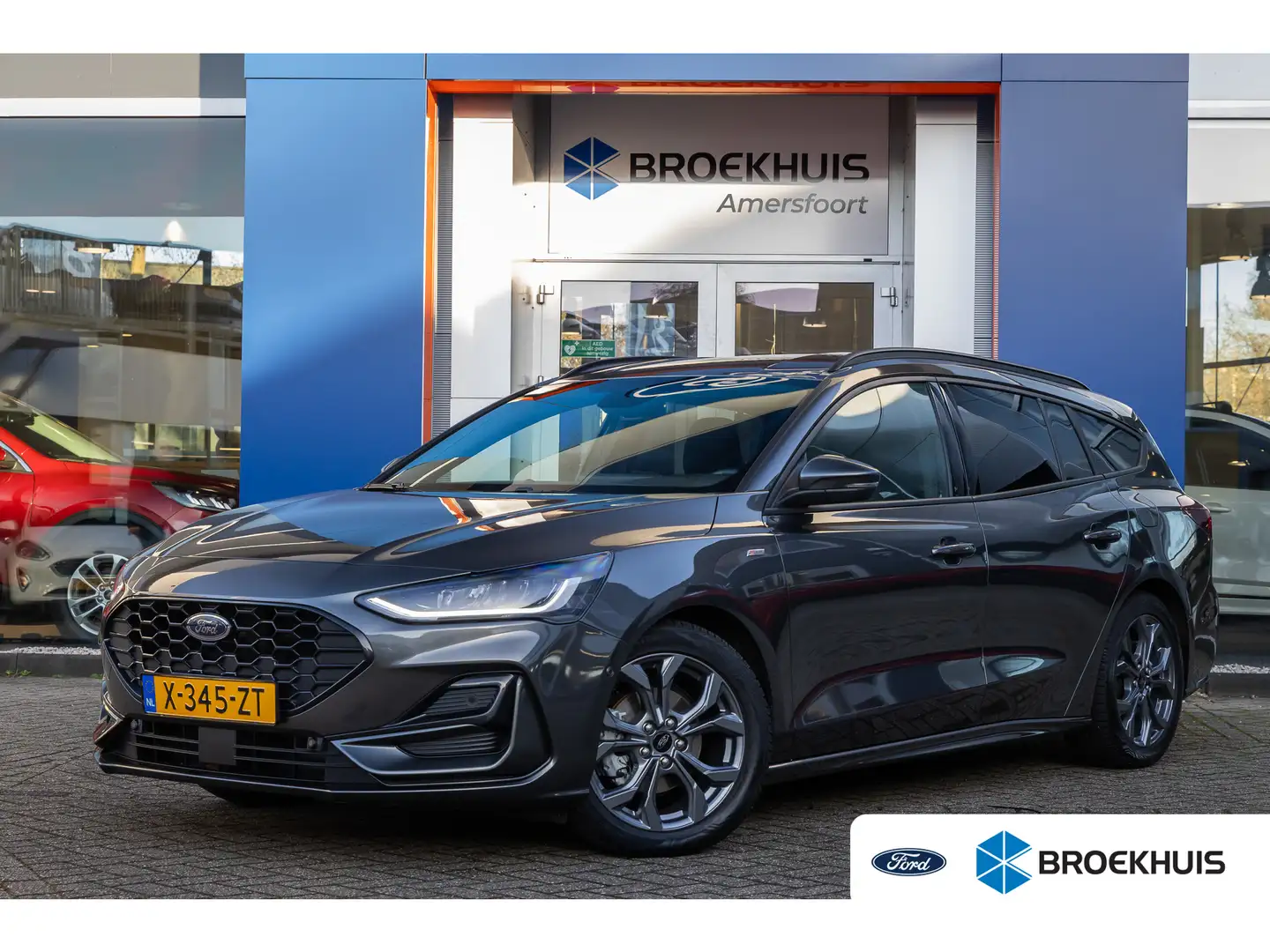 Ford Focus Wagon 1.0 EcoBoost Hybrid ST Line | Trekhaak | Sto Gris - 1