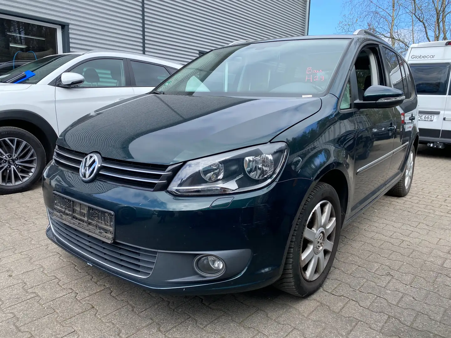 Volkswagen Touran 2.0 TDI Highline 7-Sitze Scheckheft Pano Navi AHk Groen - 1