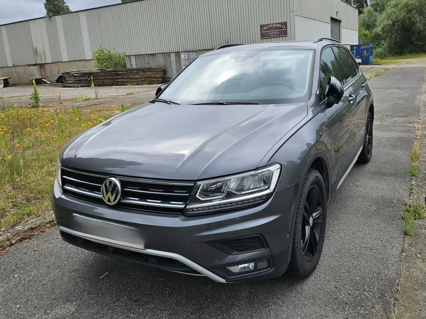 Volkswagen Tiguan Tiguan 2.0 TDi SCR 4Motion Offroad DSG Grijs - 1