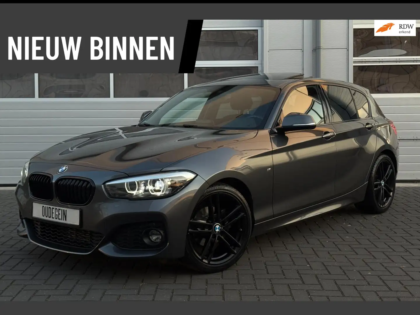 BMW 118 1-serie 118i Edition M Sport Shadow Edition / Open Grijs - 1