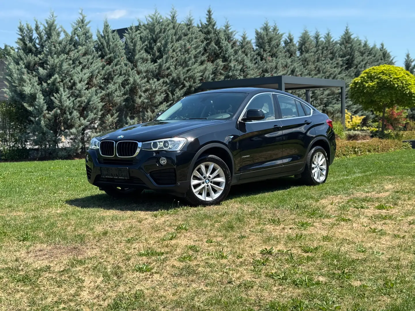 BMW X4 xDrive20i Aut.|WENIG KM*SEHR GEPFLEGT*FINANZIERUNG Black - 1
