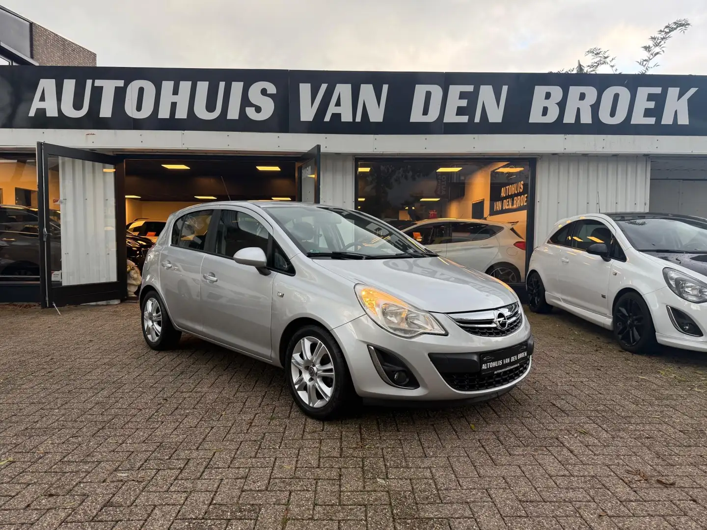 Opel Corsa 1.2-12V Facelift|5Deurs|Airco|Cruise|Lmv|Elek Pakk Argent - 1