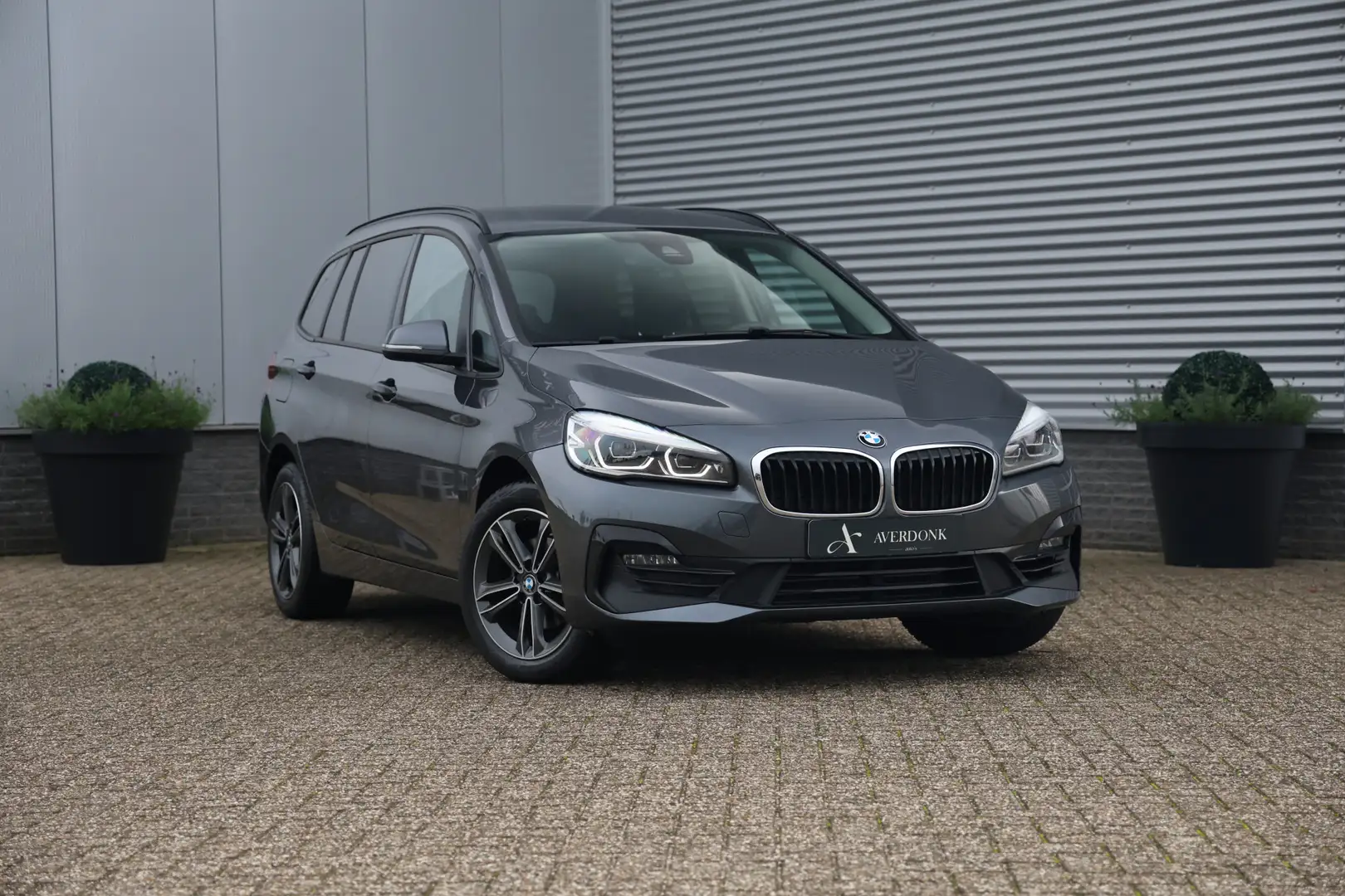 BMW 216 2-serie Gran Tourer 216i EXECUTIVE SPORT LINE 7P H Grijs - 1