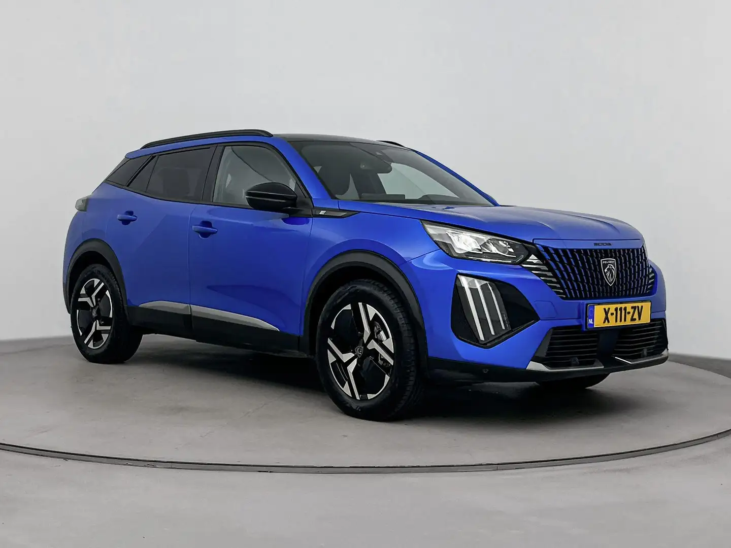 Peugeot e-2008 EV Allure 54 kWh | Accu 97% | Fase 3 | Panorama da Blauw - 2