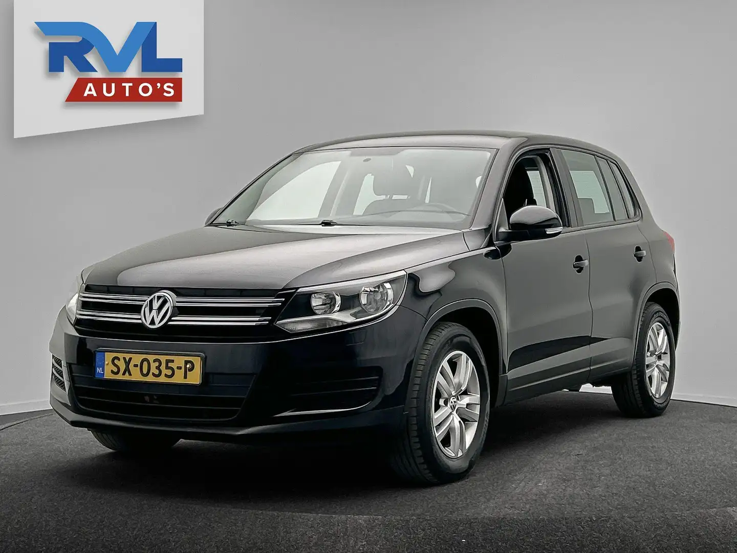 Volkswagen Tiguan 1.4 TSI Comfort&Design Edition Stoelverwarming Nav Zwart - 1