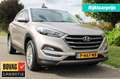 Hyundai TUCSON 1.6 T-GDI 177pk Comfort automaat 4WD ECC/cruise/na Bruin - thumbnail 1