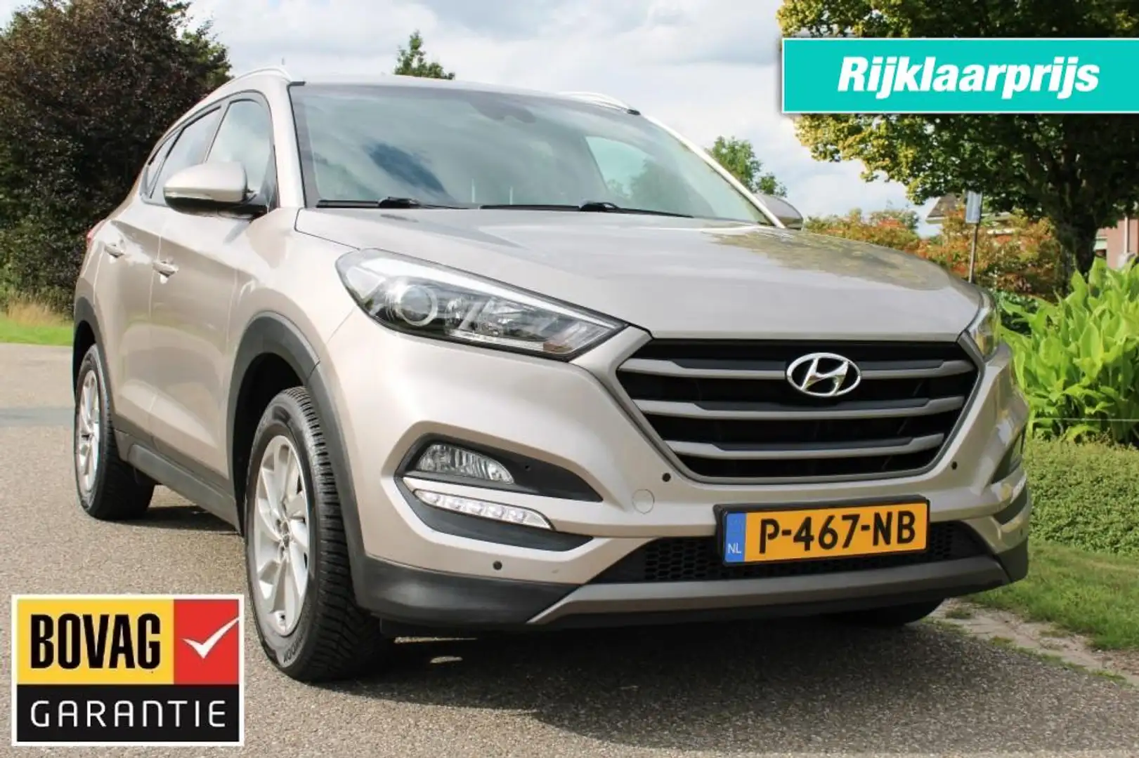Hyundai TUCSON 1.6 T-GDI 177pk Comfort automaat 4WD ECC/cruise/na Bruin - 1