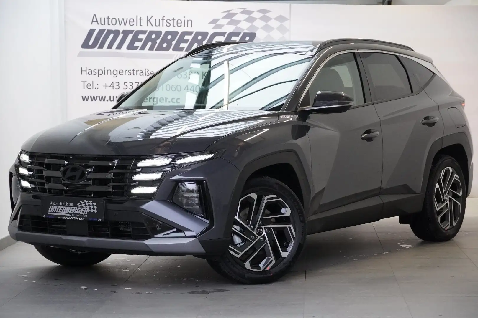 Hyundai TUCSON NX4 Prestige Line 1,6 T-GDi HEV 4WD AT, abzüglich Grau - 1