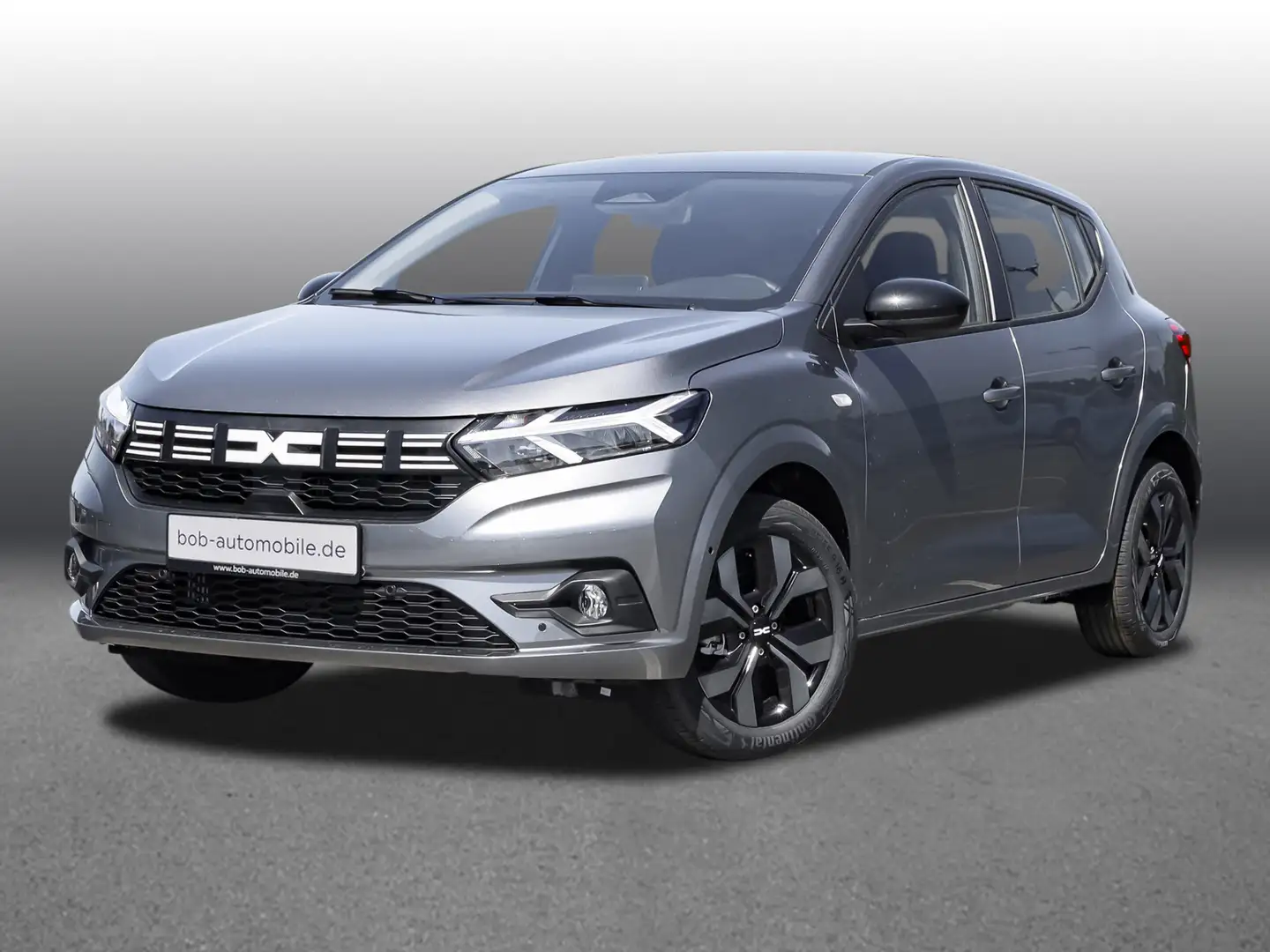 Dacia Sandero Journey+ ECO-G 100 8-fach bereift NAVI Grijs - 1