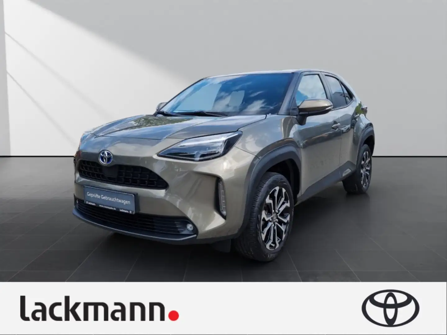Toyota Yaris Cross 1.5 Hybrid Team D*Navi*Winterpaket* Brons - 1