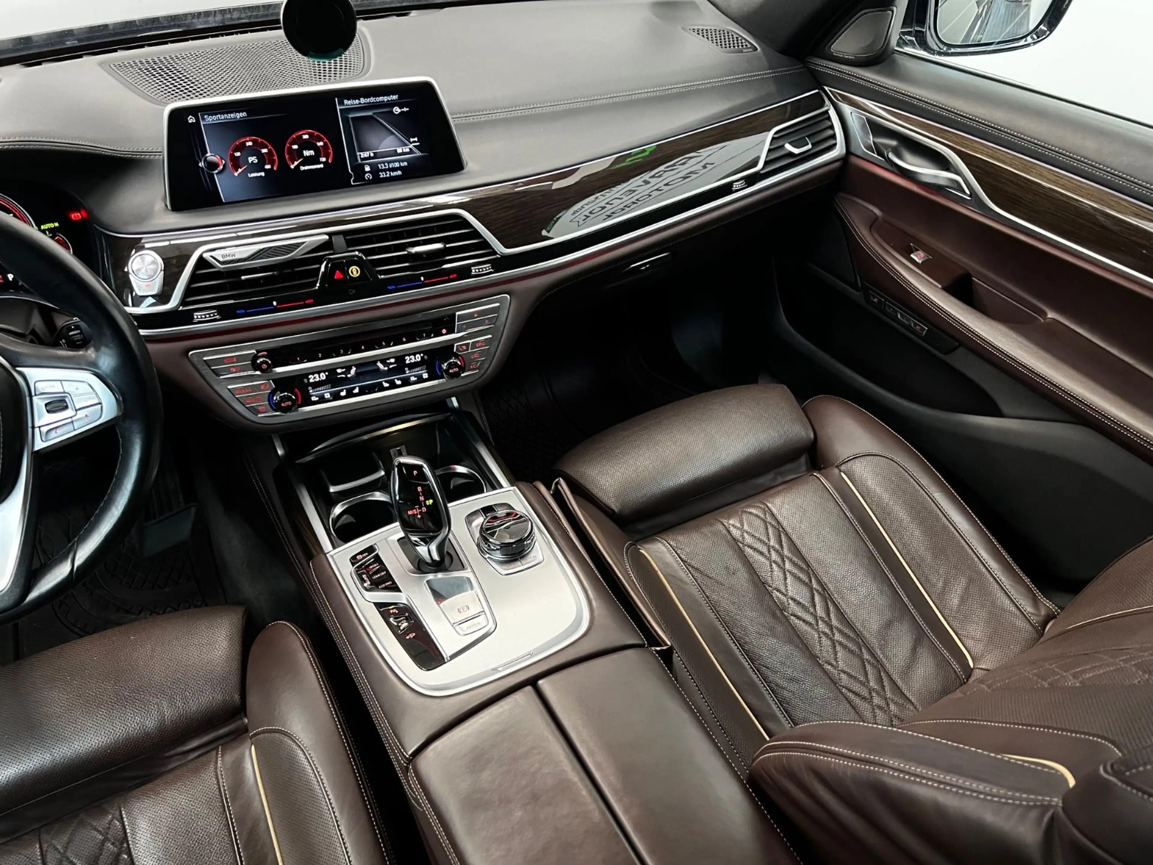 BMW 750 i xDrive Individual *H&K*ACC*360°CAM*SHD* — photo 11