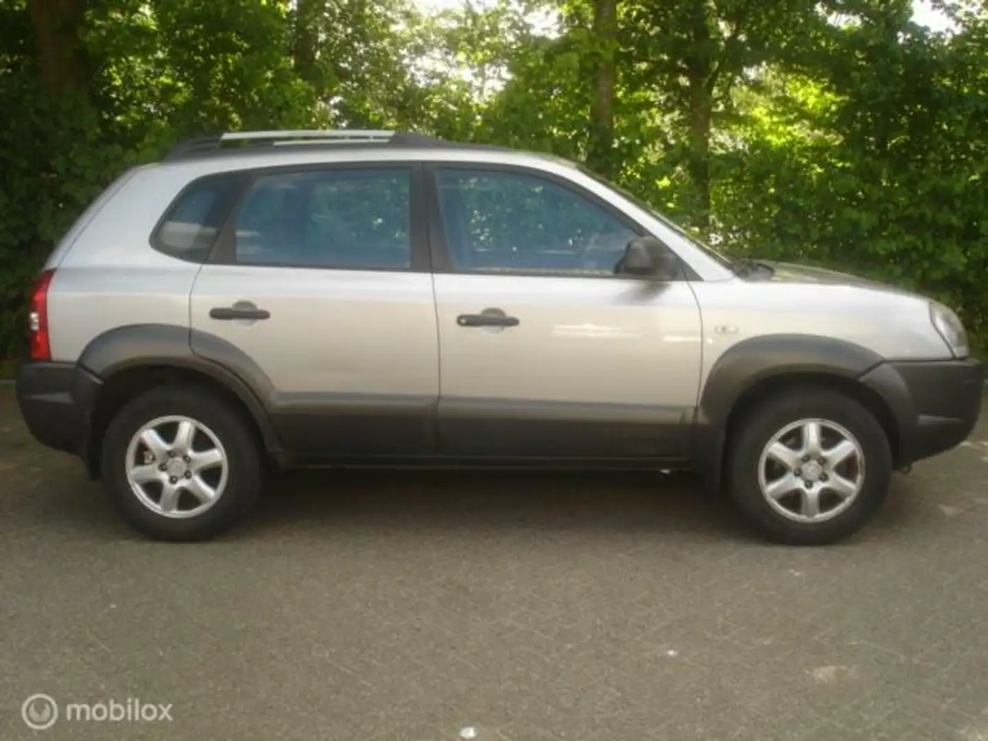 Hyundai TUCSON 2.0 I 16V 104 KW Active Airco APK 11-2026. Grijs - 2