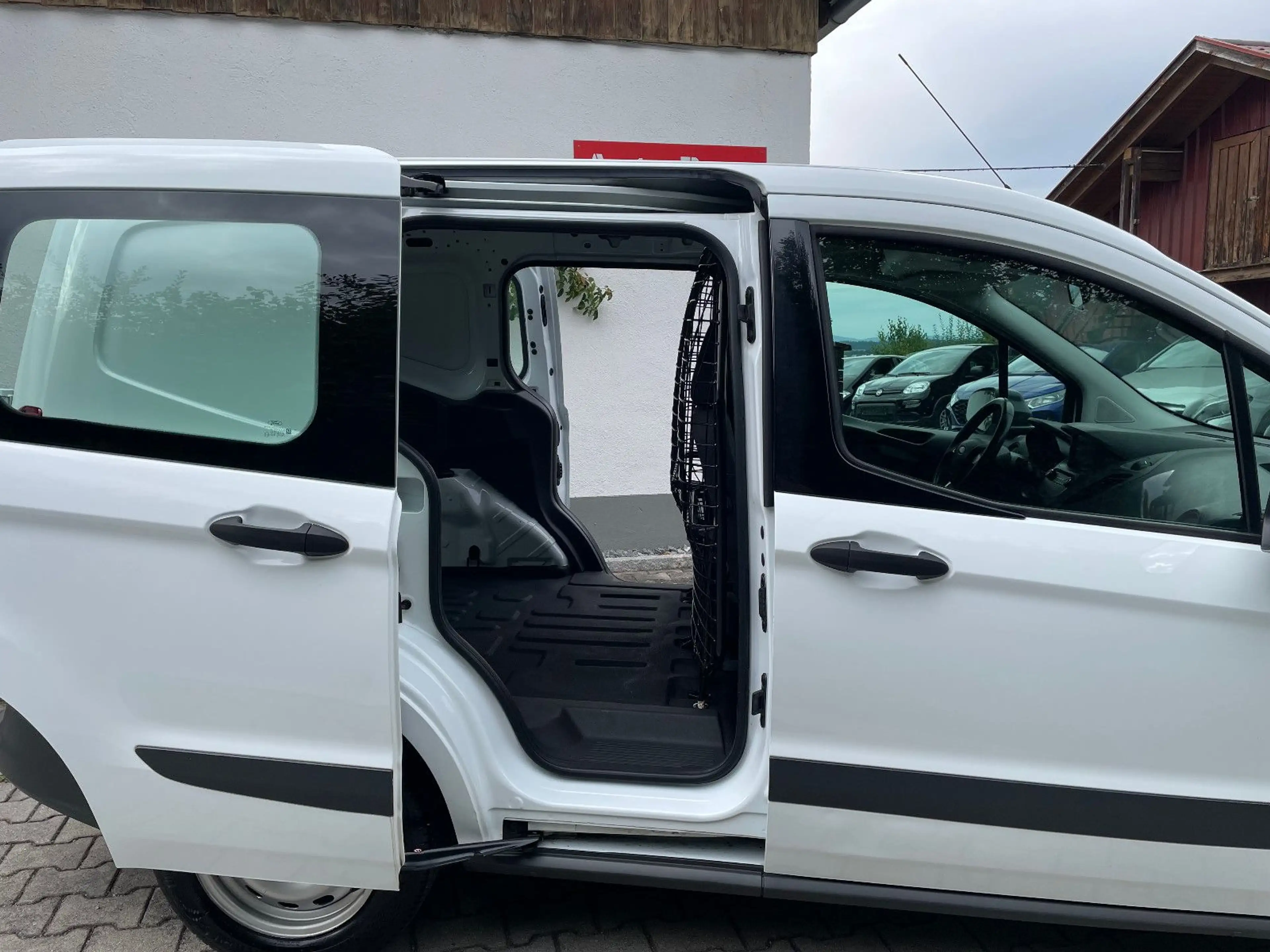 Ford Transit Courier 1 Hand 100000km 2 Schiebetüren — photo 21