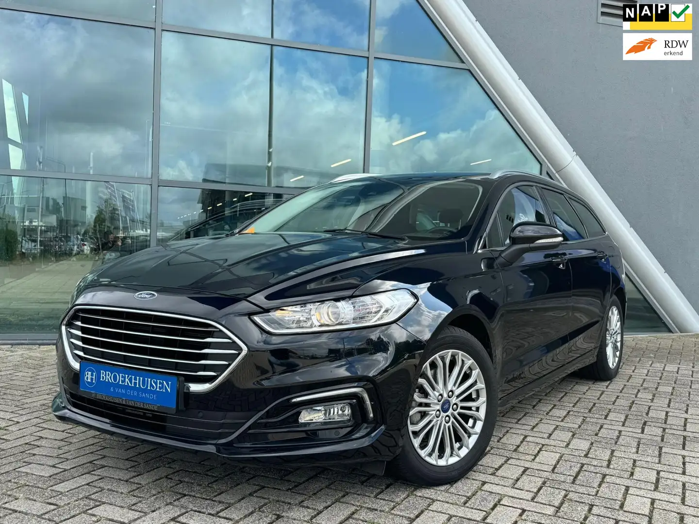 Ford Mondeo Wagon 2.0 IVCT HEV Titanium 191pk Automaat / Stoel Zwart - 1