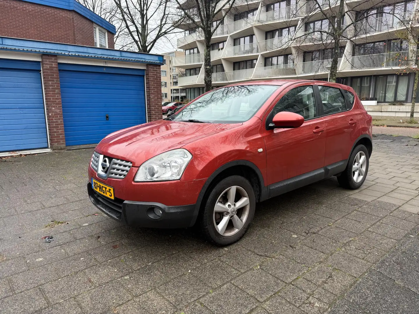 Nissan Qashqai 1.6 84kw Acenta Airco Cruise NAP Rood - 1