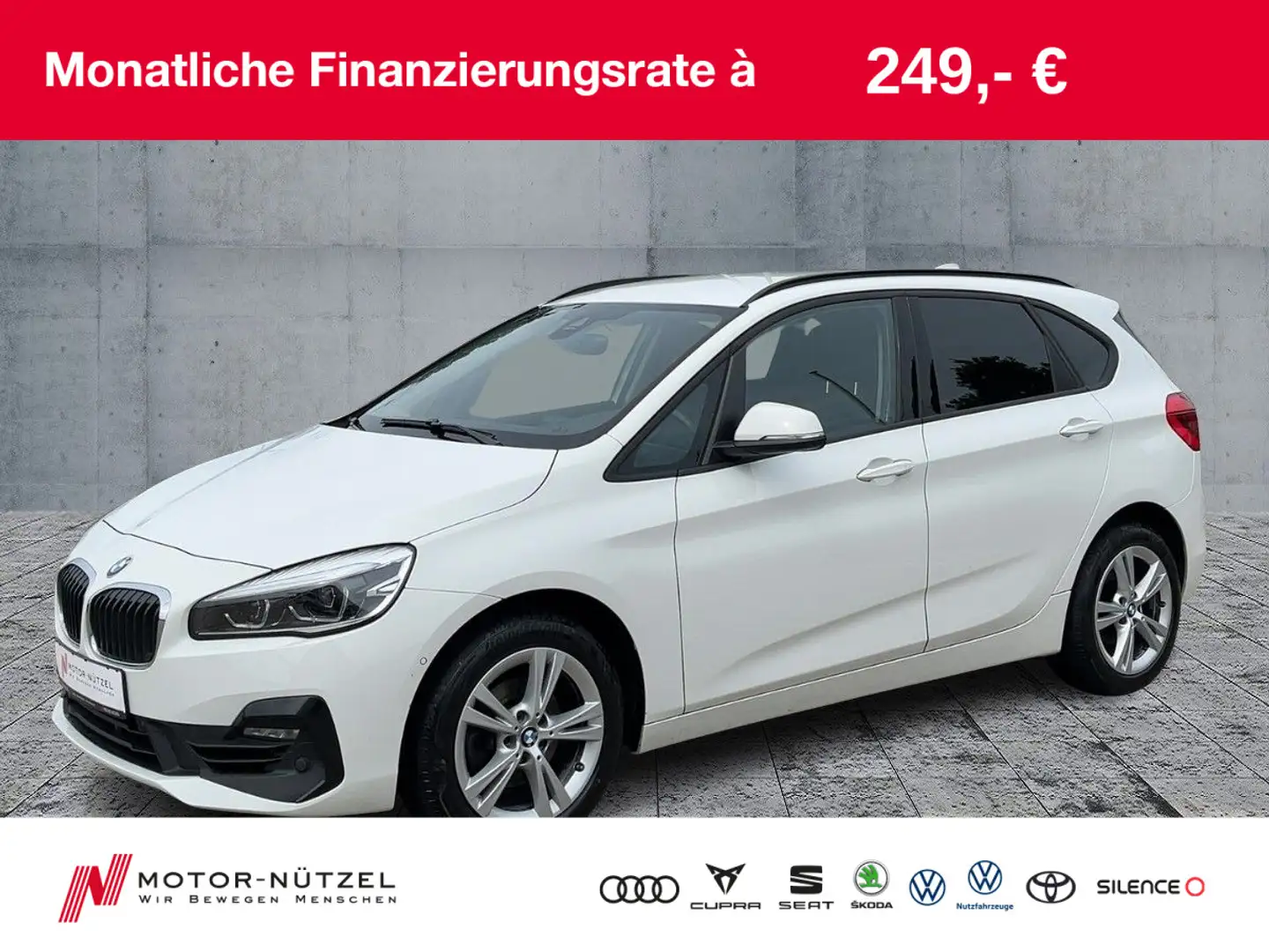 BMW 218i Active Tourer AHK+SHZ+2xPDC+DAB+NSW+MFL+17" Wit - 1