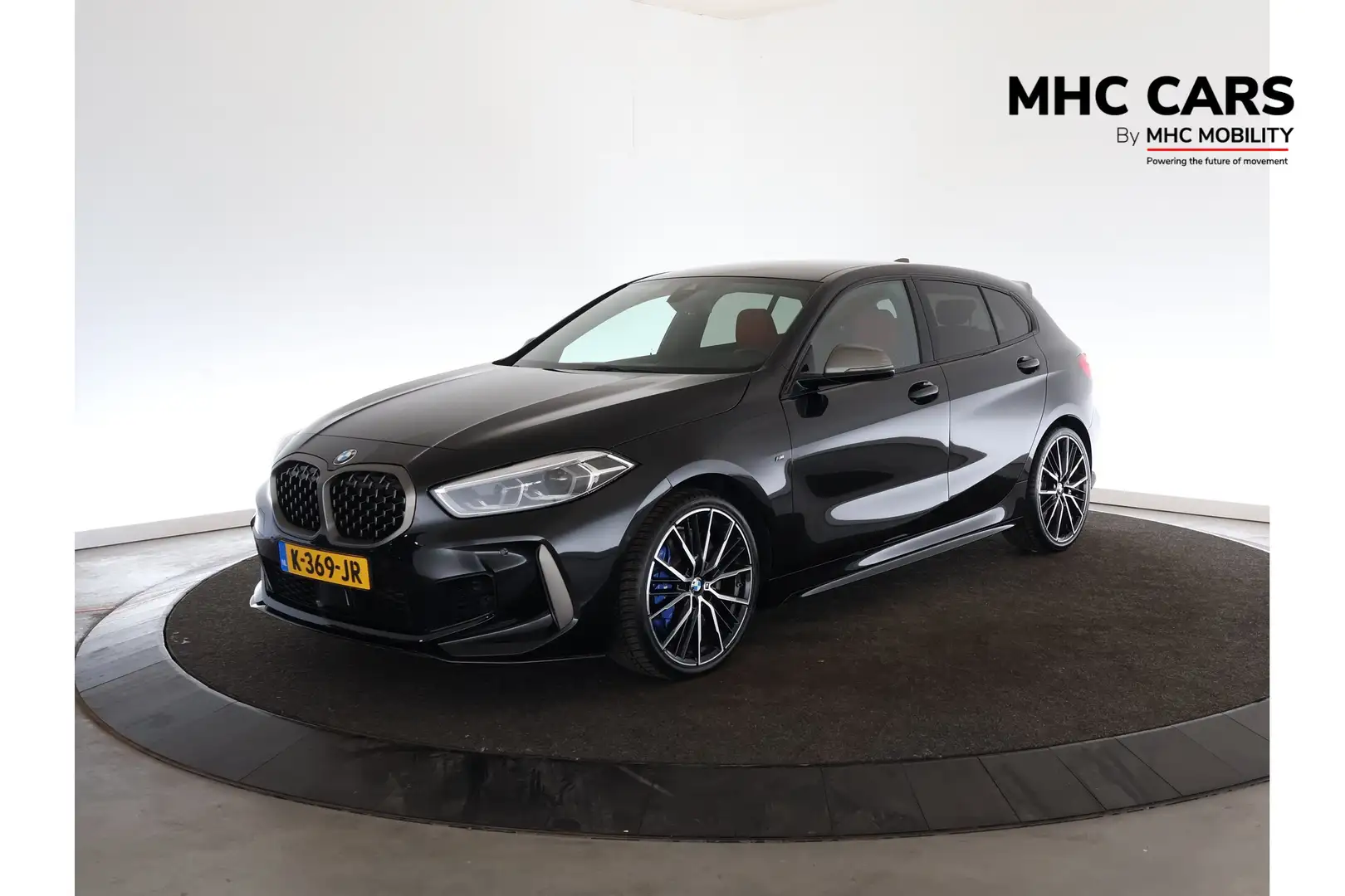 BMW 135 1-serie M135i xDrive High Executive Edition | Lede Zwart - 1