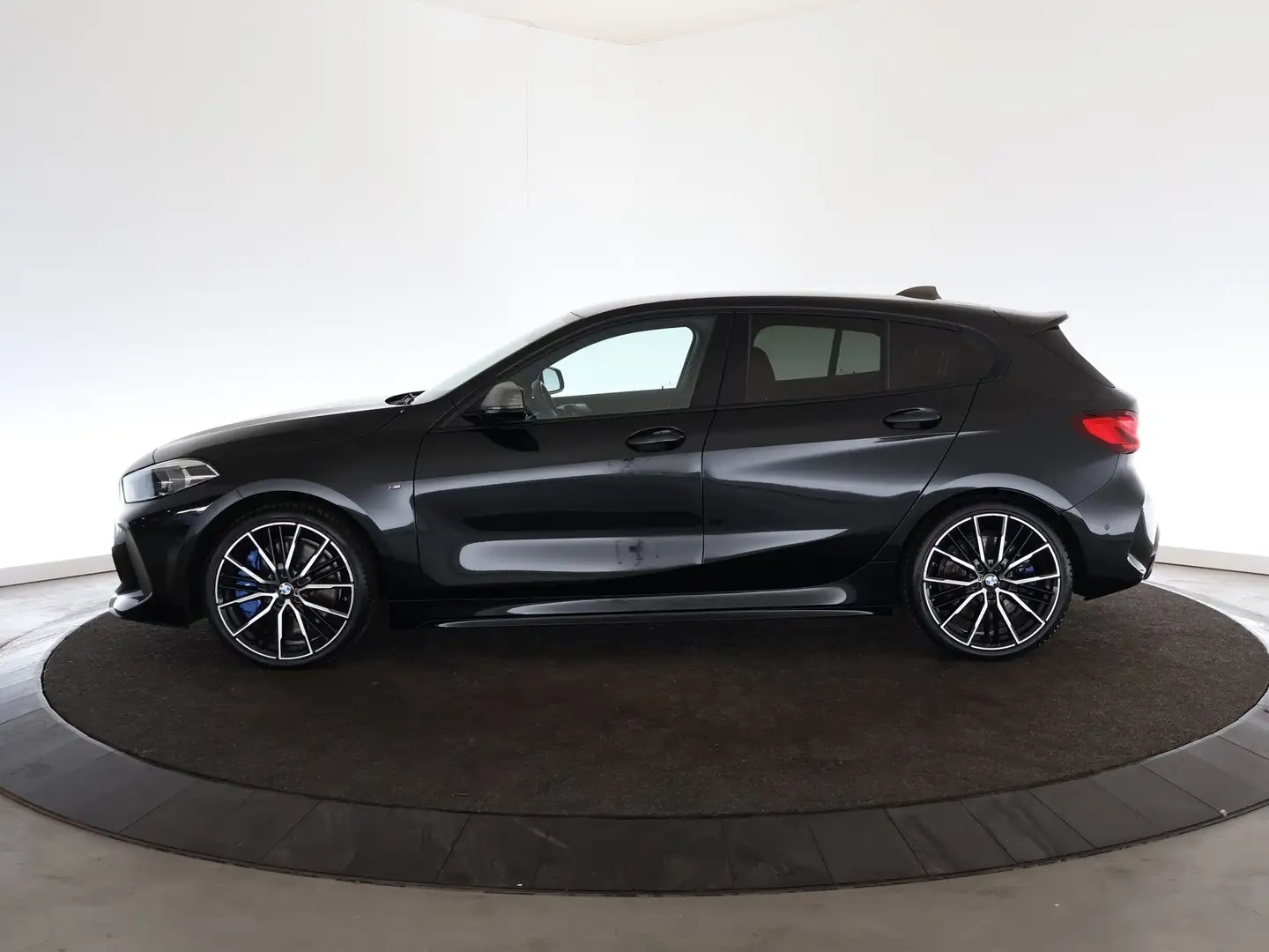 BMW 135 1-serie M135i xDrive High Executive Edition | Lede Zwart - 2