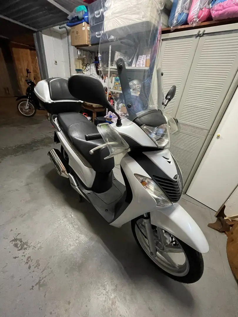 Honda SH 150i Frenata combinata - 1