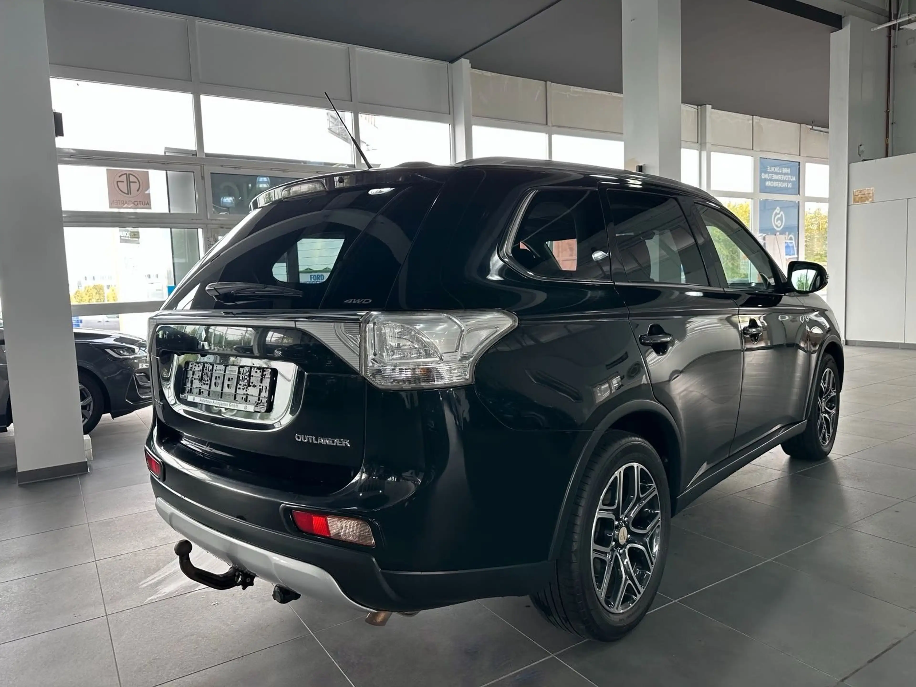 Mitsubishi Outlander ClearTec Instyle 4WD*Kam*Navi*Leder* 7 — photo 4