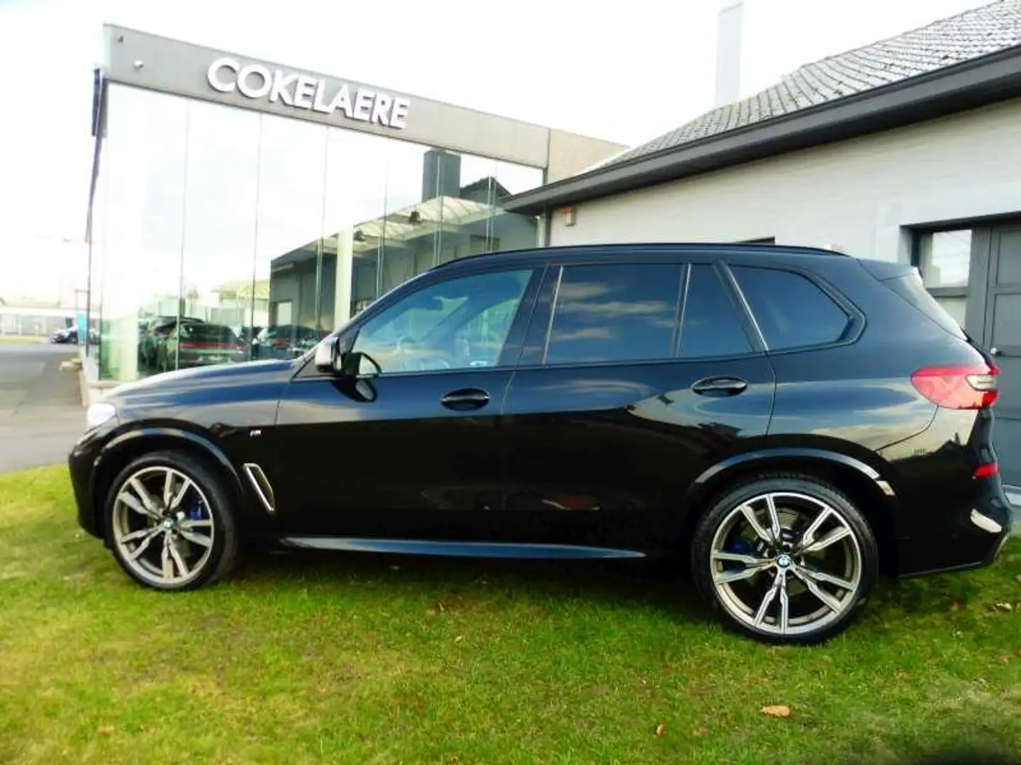 BMW X5 M50 dAS PanoDak/MemorySeats/Camera/1steHand/22" Zwart - 2