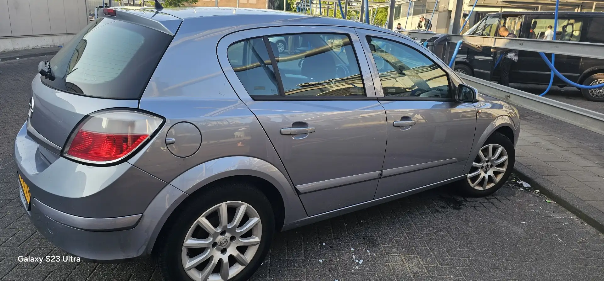 Opel Astra 1.4 Enjoy Grijs - 1