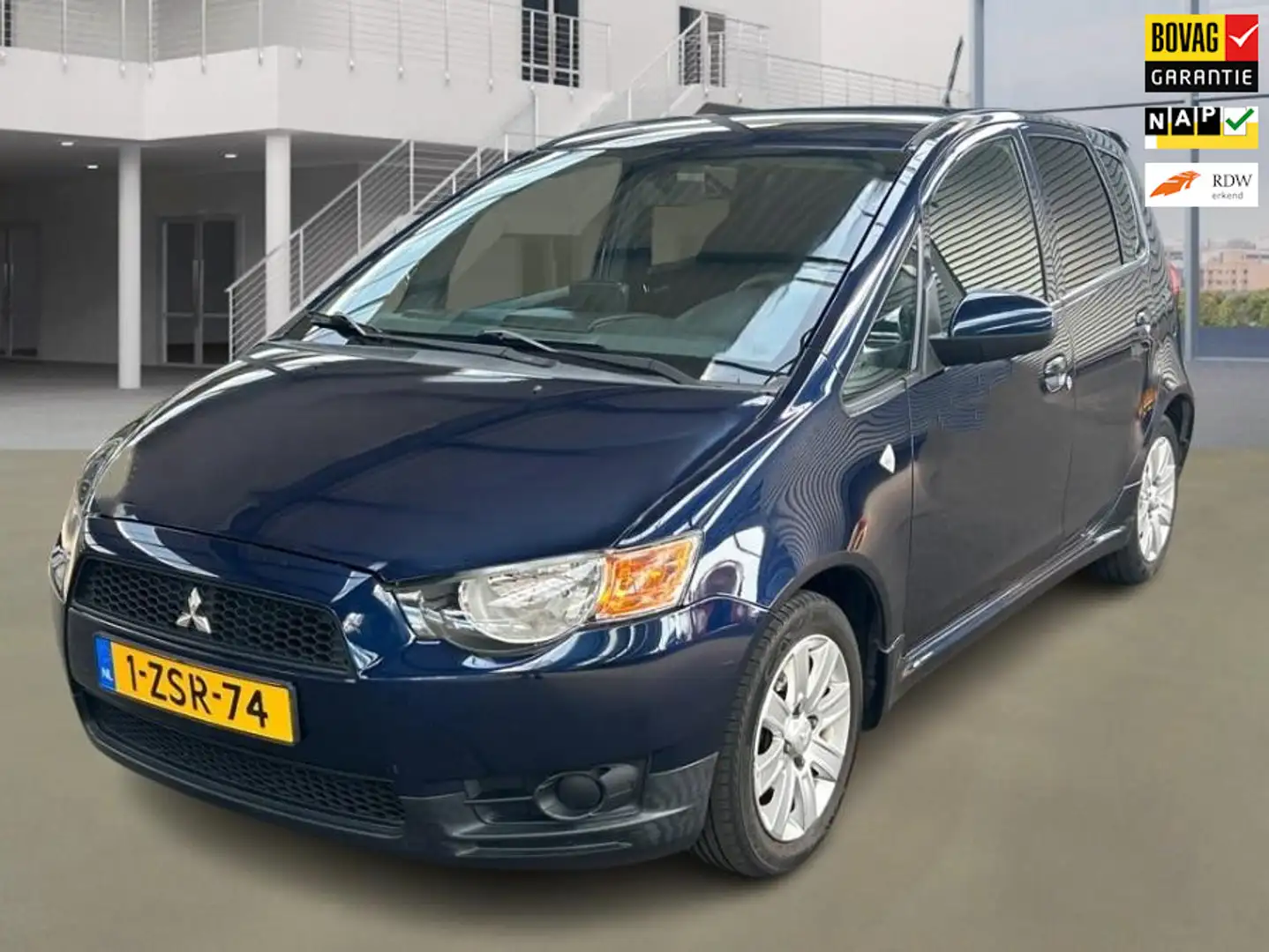 Mitsubishi Colt 1.3 Edition Two 66.550 km + NAP 1e Eigenaar Blauw - 1