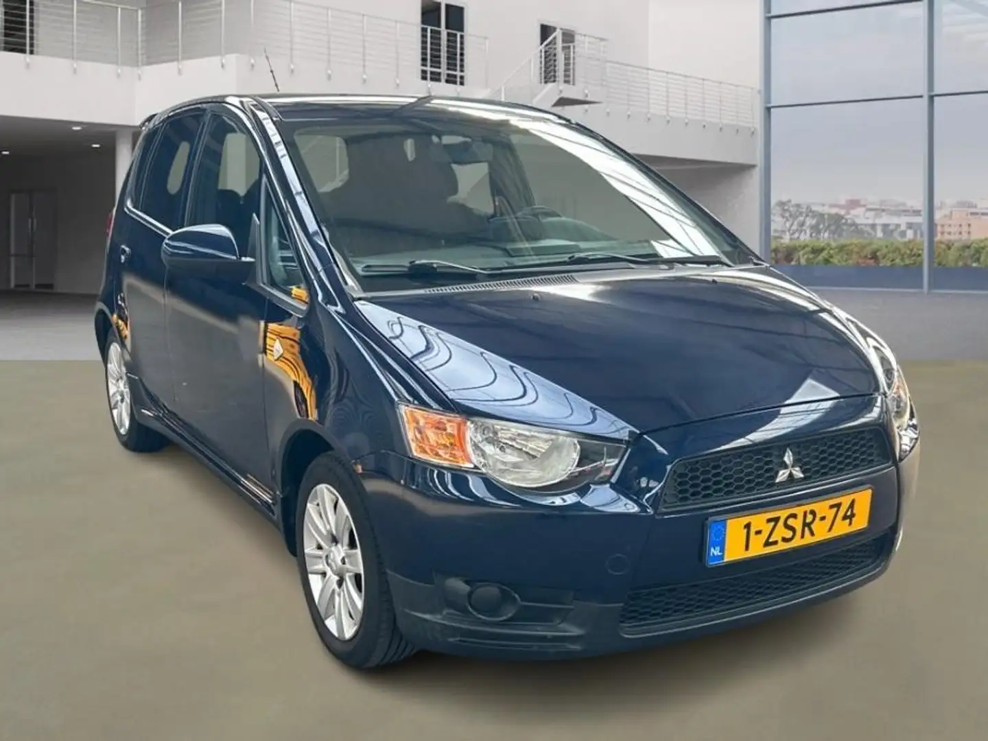 Mitsubishi Colt 1.3 Edition Two 66.550 km + NAP 1e Eigenaar Blauw - 2