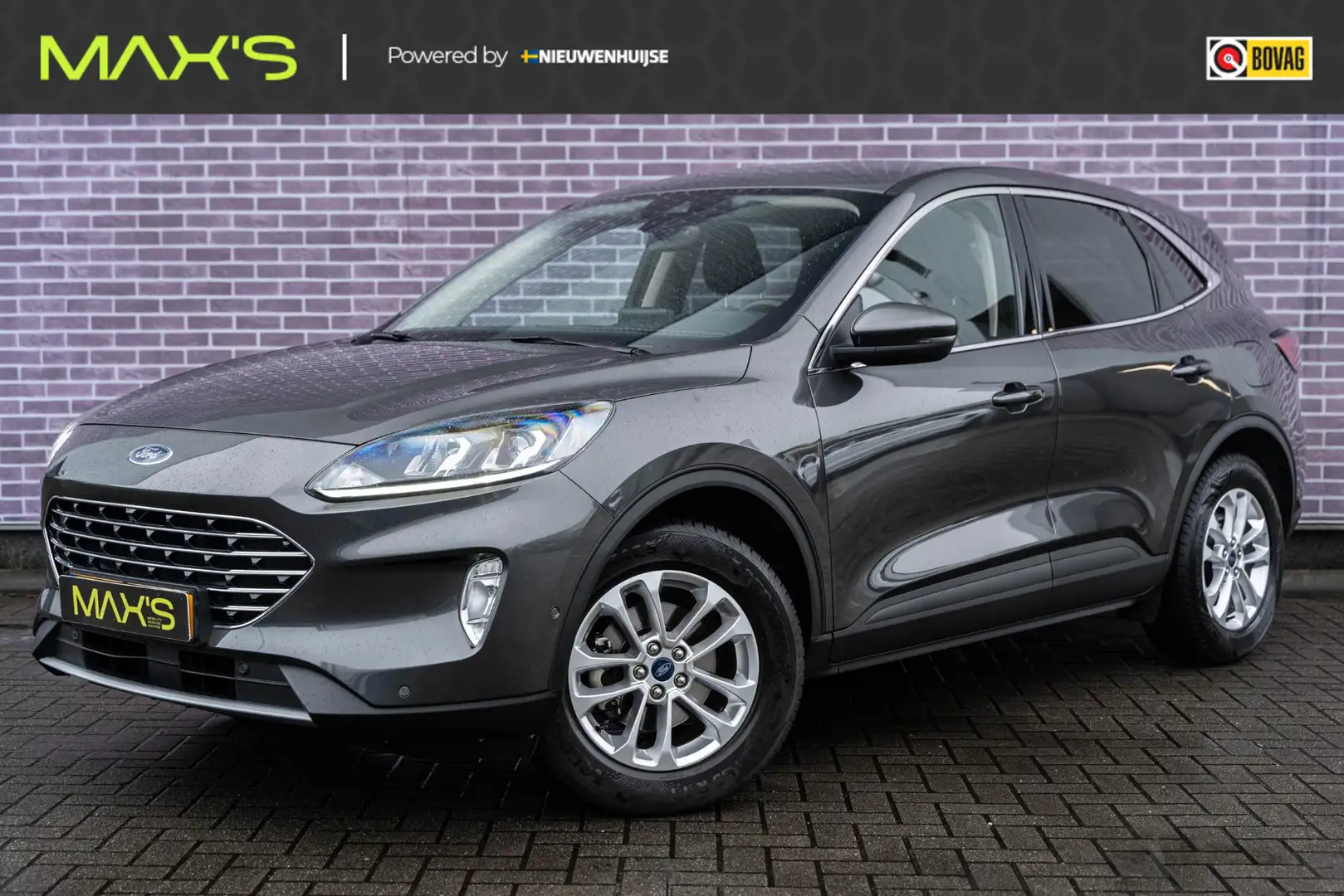 Ford Kuga 1.5 EcoBoost Titanium | Zeer weinig kilometers | T Grijs - 1