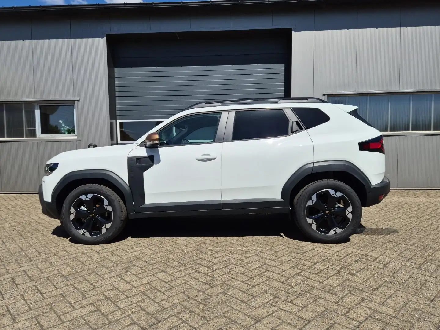 Dacia Duster Extreme Hybrid 140PS Automatik 1.6 SCE 4x Kamer... Weiß - 1