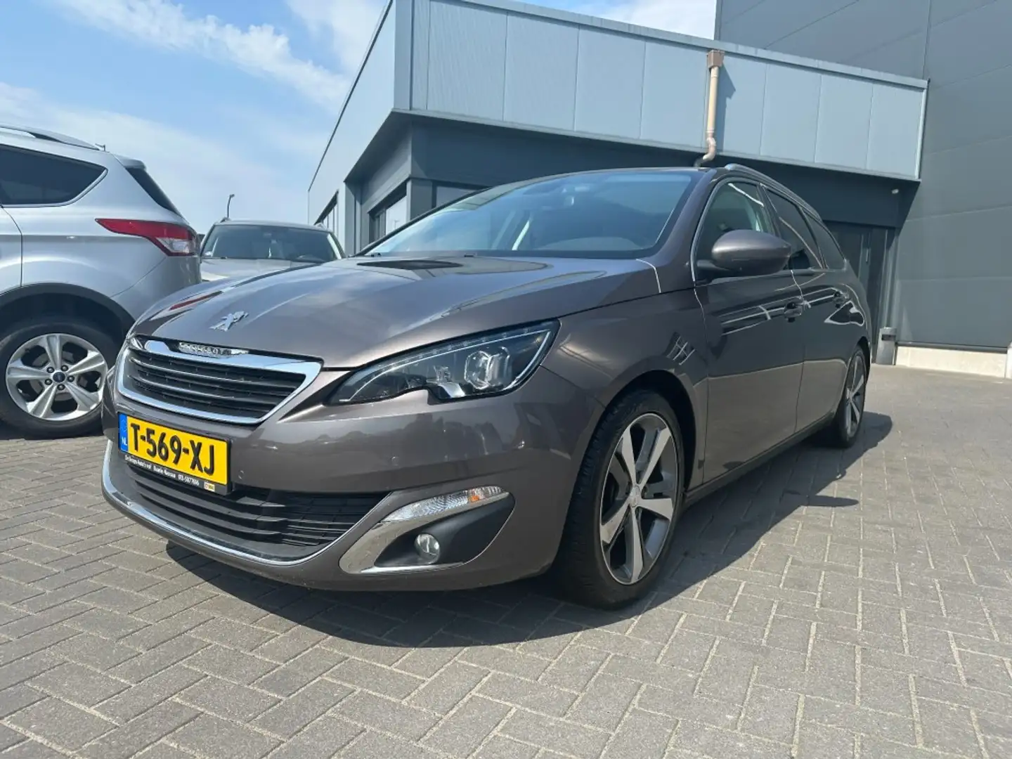 Peugeot 308 308 SW 1.2e-THP Premiere Navi Panorama Trekhaak Grijs - 1