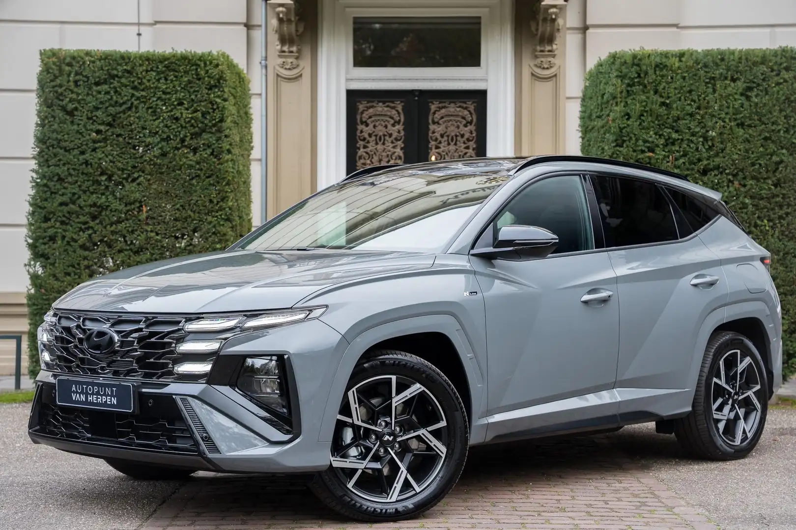 Hyundai TUCSON 1.6 T-GDI PHEV N Line Sky NIEUW | PANO | CAMERA | Gris - 1