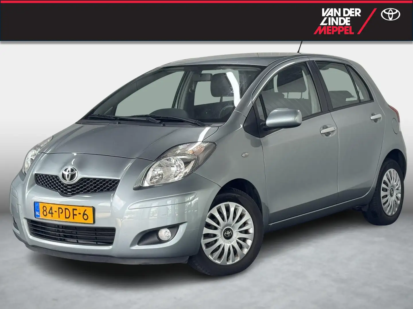 Toyota Yaris 1.3 VVTi Aspiration PDC Clima 5Drs Grijs - 1