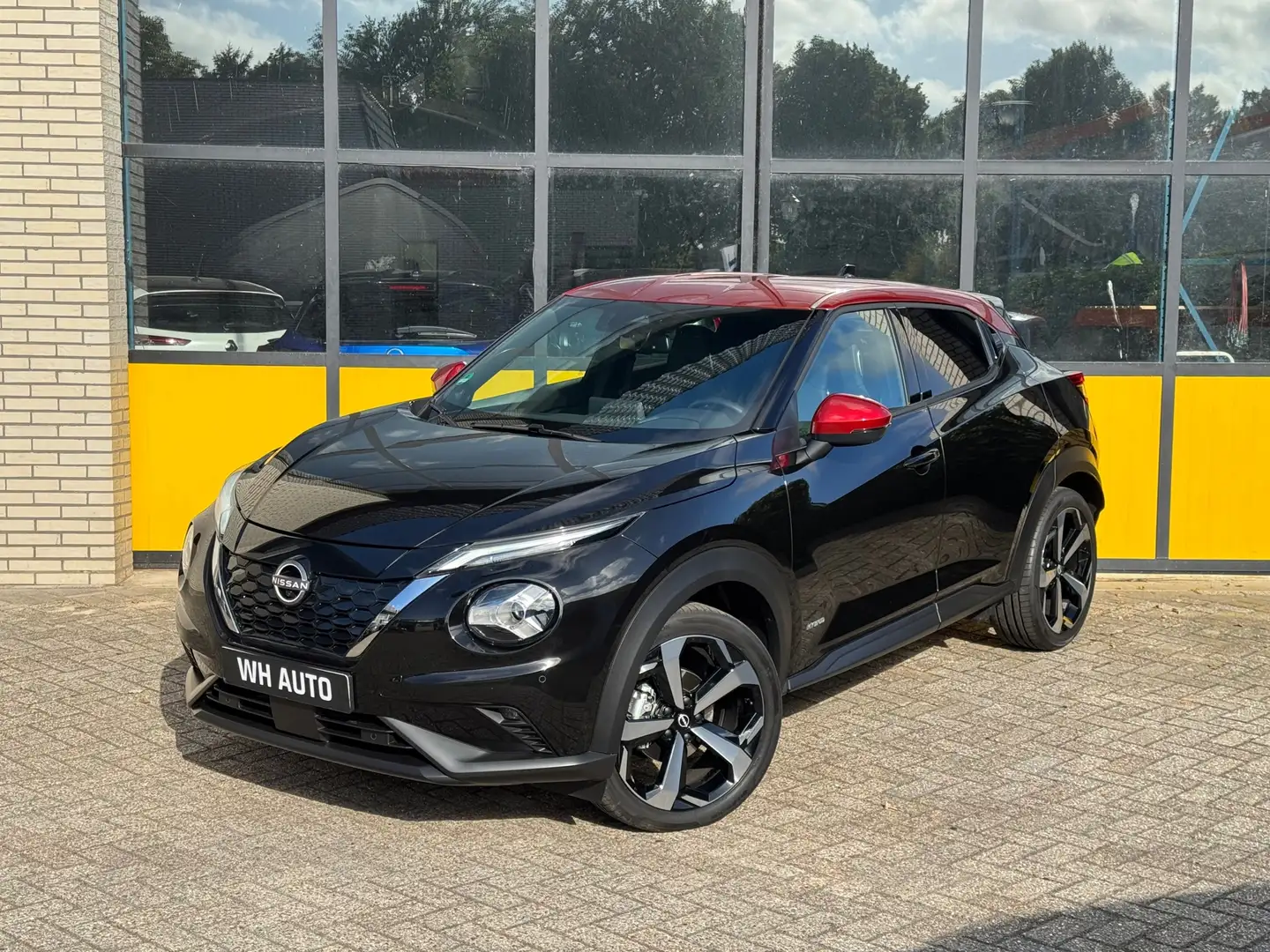 Nissan Juke 1.6 Hybrid Tekna Zwart - 1
