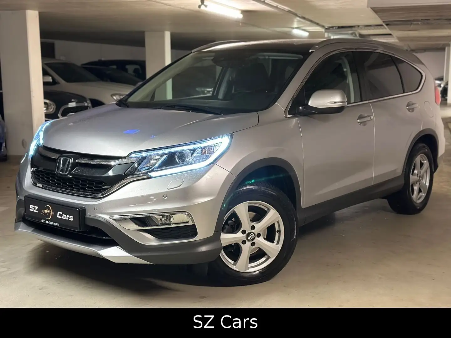 Honda CR-V Executive 4WD**ACC*KEYLESS*PANO*KAM*AHK Silber - 1
