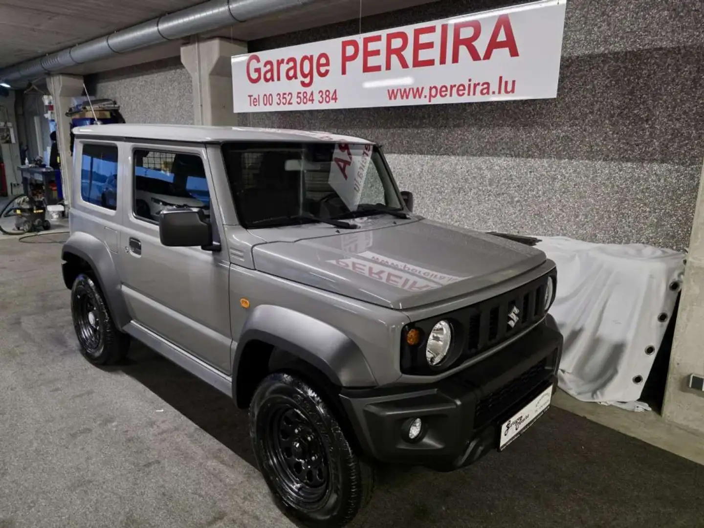Suzuki Jimny 1.5 ALLGRIP COMFORT AHK 1 HAND Gris - 1