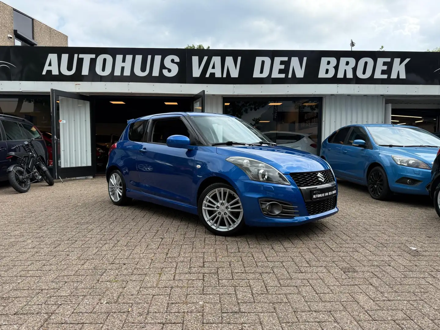 Suzuki Swift 1.6 Sport 136Pk|Xenon|Cruise|Clima|Stoelverw|Keyle Blauw - 2