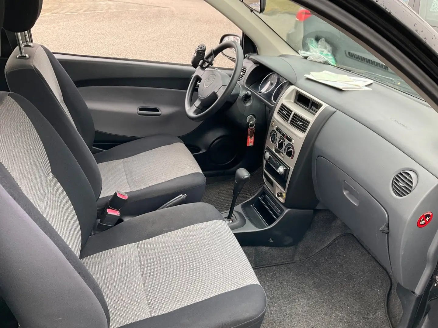 Daihatsu Cuore 1.0 Top Automatik 1.Hand Schwarz - 2