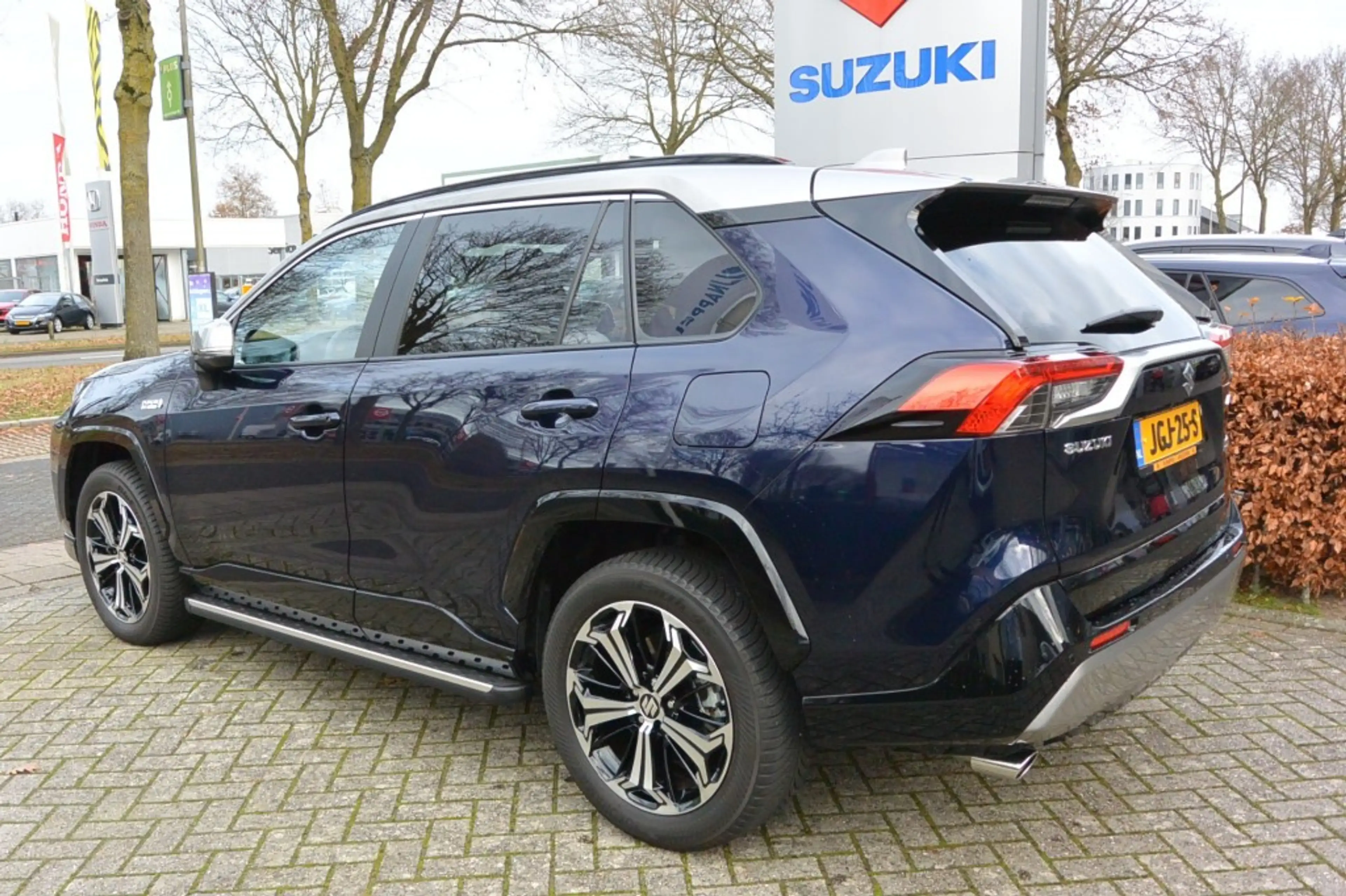 Suzuki Across 2.5 Stijl Plug inn Hybrid 4WD - Two-tone / Leder — photo 6