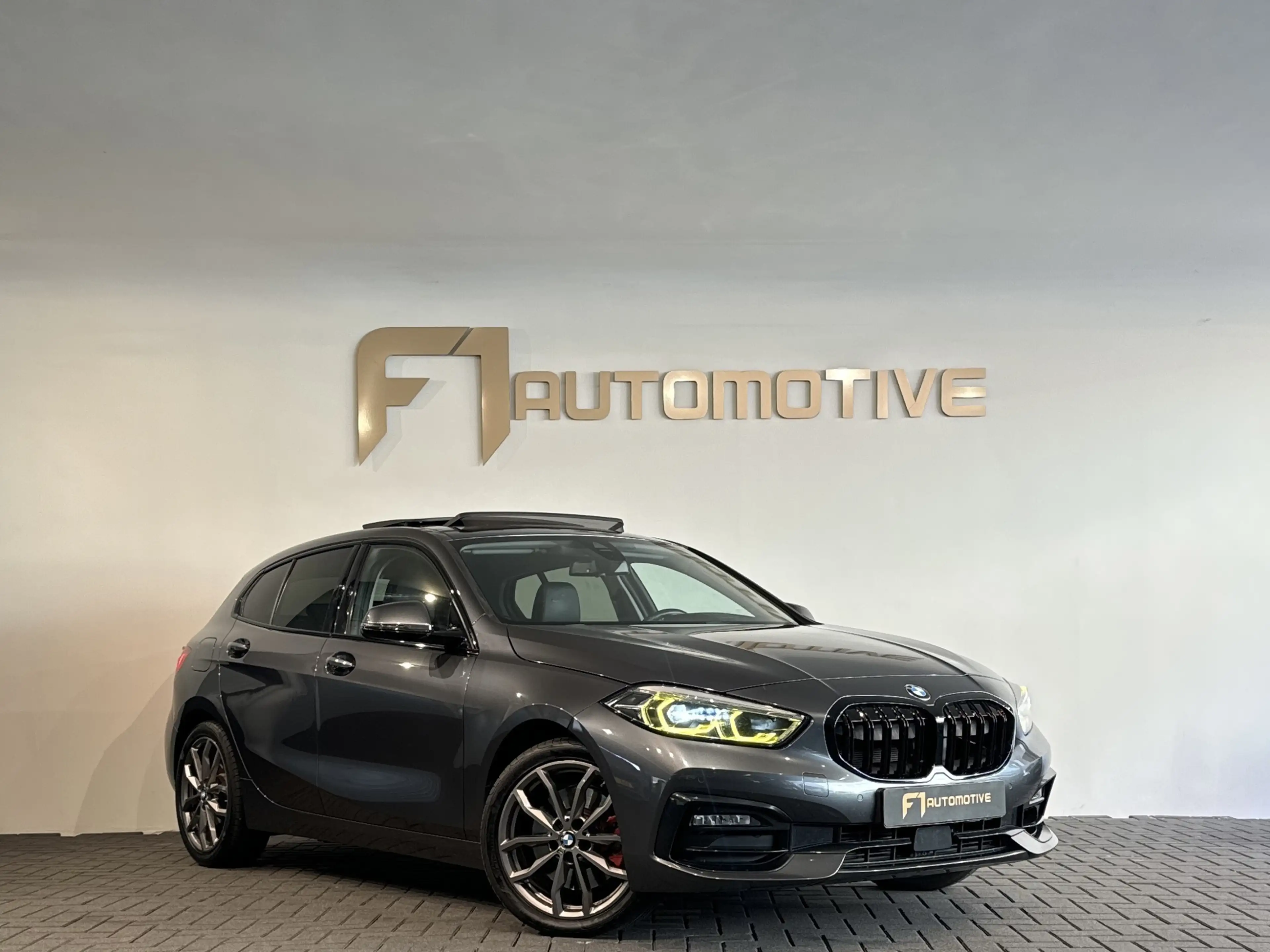 BMW 120 1-serie 120i High Executive Pano|Stoelverwarming|C — photo 3