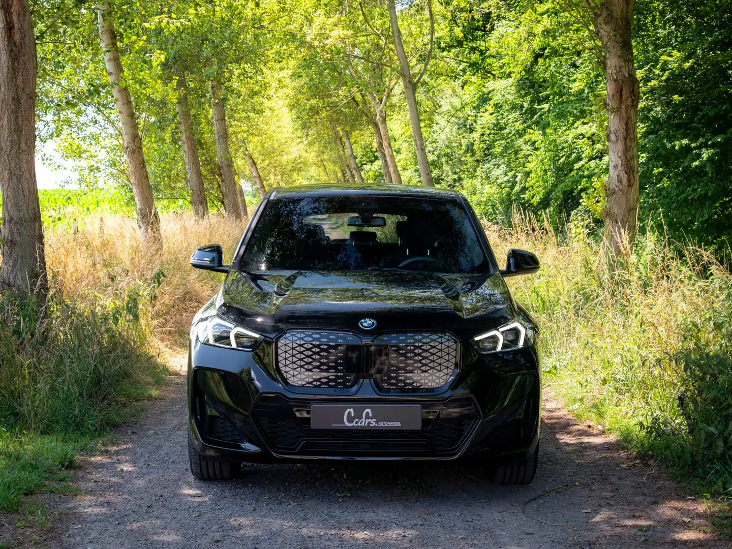 BMW iX1 eDrive20 M Sport | PREMIUM PACK | ACC | PRIVACY Zwart - 2